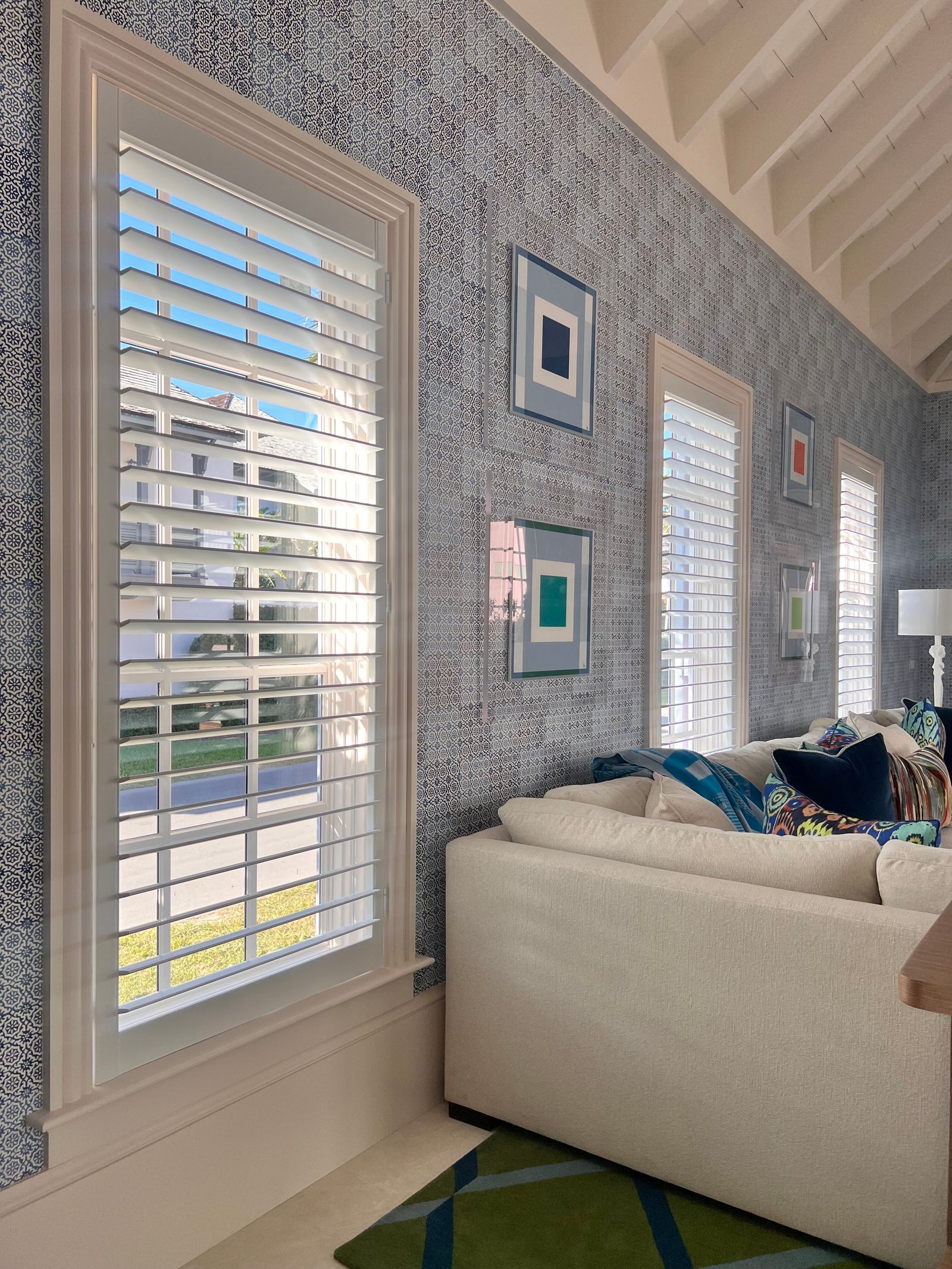 Coastal living room with plantation shutters in the Big Bend